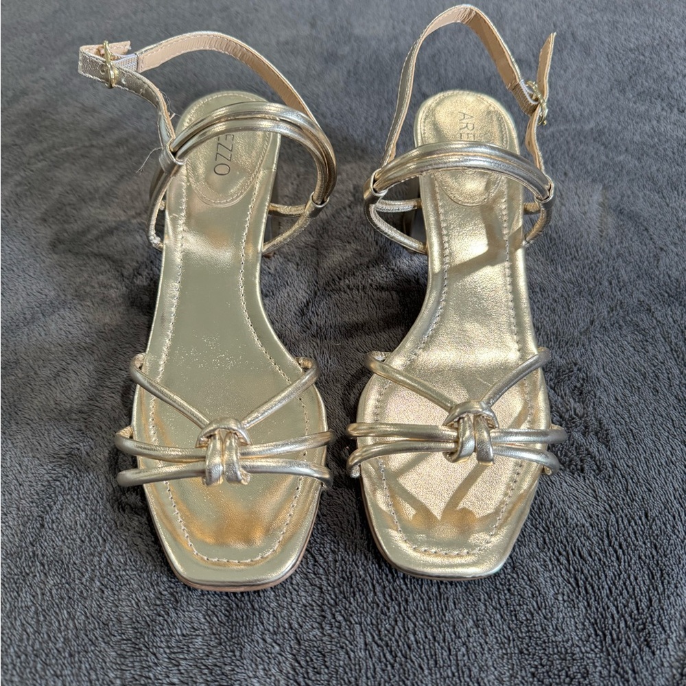 Brand new golden sandals